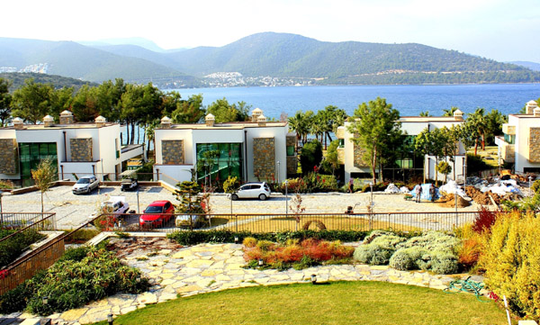 Turistik yörelerin dokusuna uygun konut üretilsin