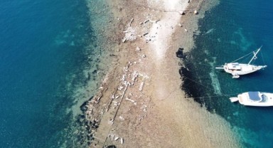 Gümüşlük koyunda sular çekildi, kral yolu ortaya çıktı