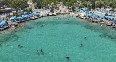 Akdeniz'in gözdesi Mersin plajlarında yoğun sezon
